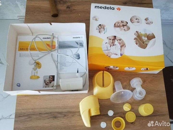 Молокоотсос medela электрический