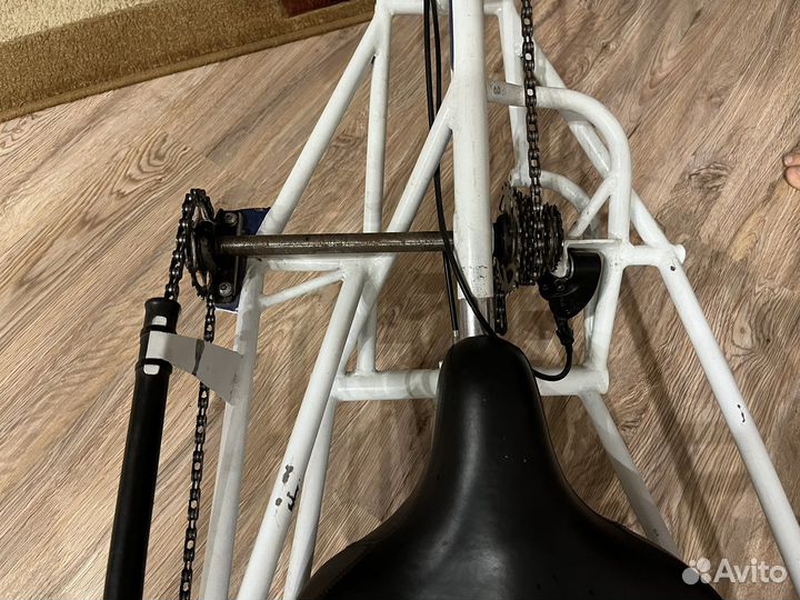 Трехколесный велосипед с детским креслом