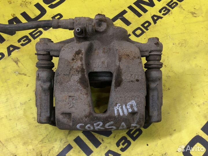 Передний правый суппорт Opel Corsa D