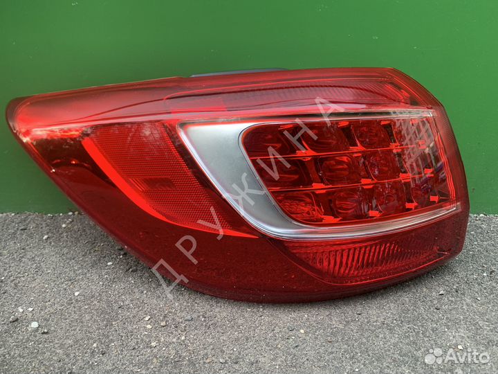Фонарь левый Kia Sportage 3