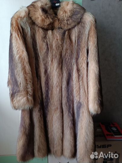 Женские шубы из енота