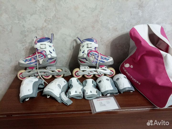 Роликовые коньки