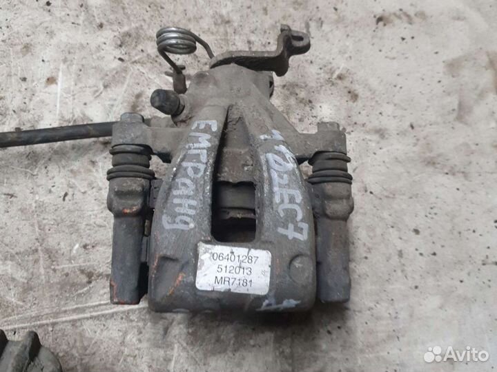 Суппорт левый Geely Emgrand ec7