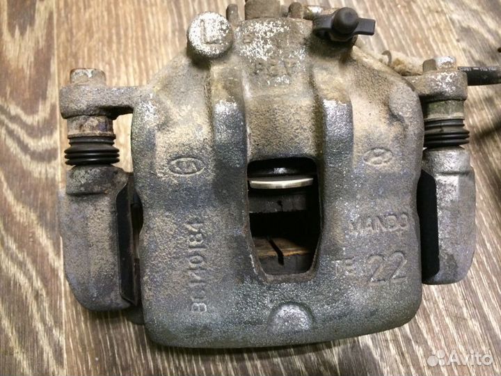 Суппорт тормозной передний Rio 3, Hyundai Solaris