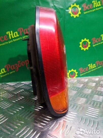 Фонарь задний левый Mitsubishi Carisma