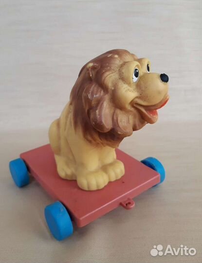 Игрушка Резиновый лев на тележке