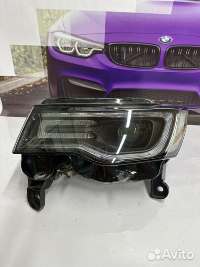 Фара передняя левая Jeep Grand Cherokee черная