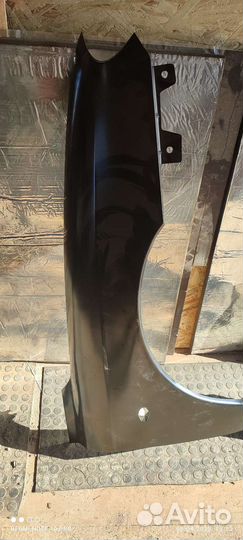 Крыло на kia spectra