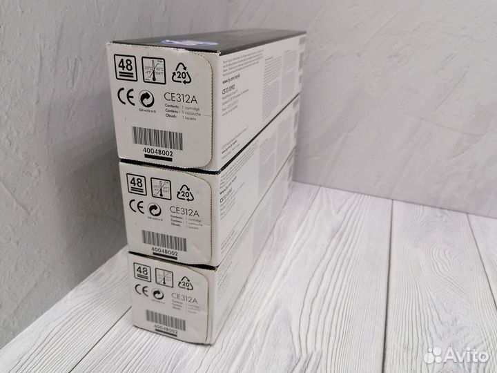Картриджи оригинальные HP CE312A разные