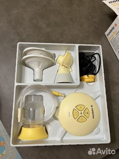 Молокоотсос medela swing flex электрический