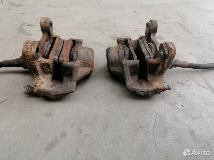 Суппорт тормозной задний Mercedes Benz 190 W201