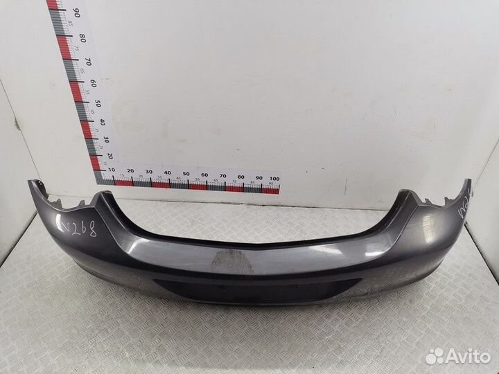 Бампер задний для Opel Astra J 13264420