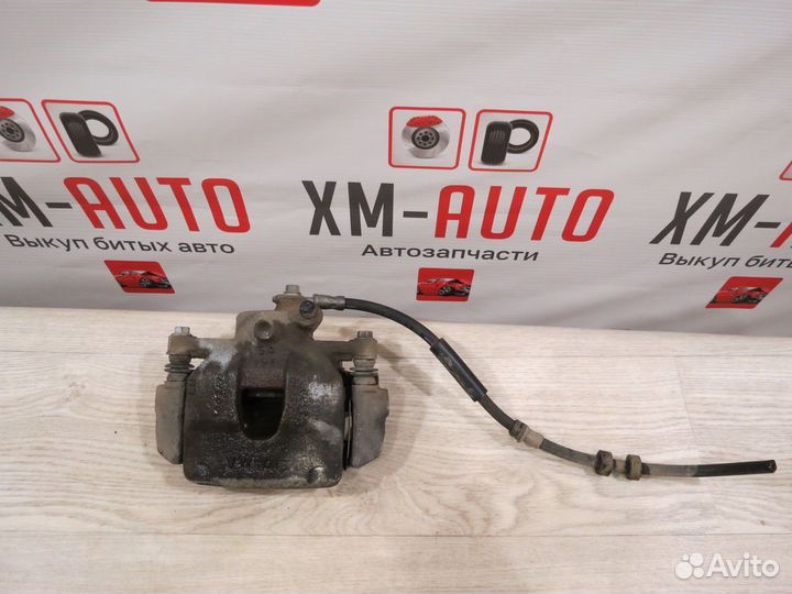 Суппорт тормозной передний левый Volkswagen Polo