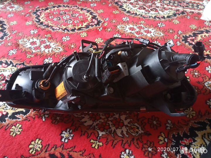 Левая фара Lancer 10