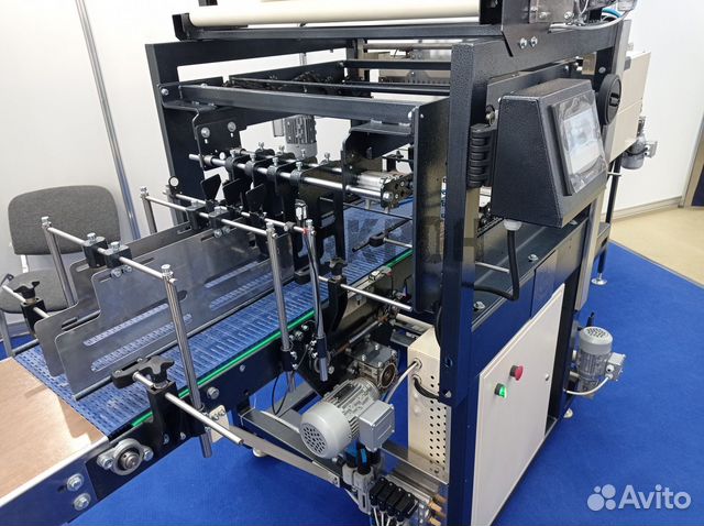 Термоусадочный упаковщик для групповой упаковки