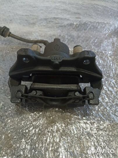 Суппорт тормозной передний левый Renault Logan L8
