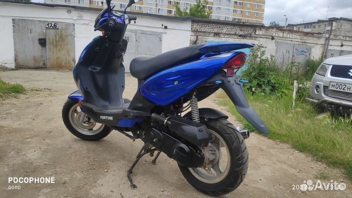 Скутер мопед