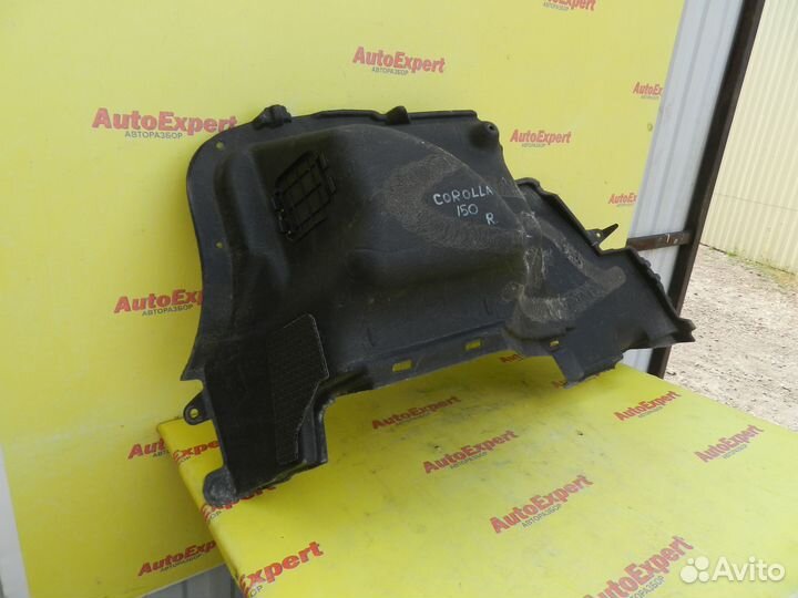 Обшивка багажника правая Toyota Corolla 150