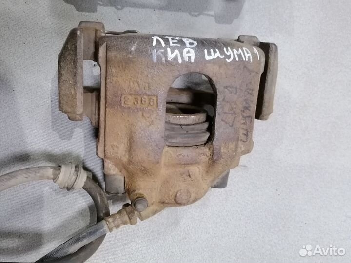 Суппорт тормозной передний для Kia Sephia/Shuma 1