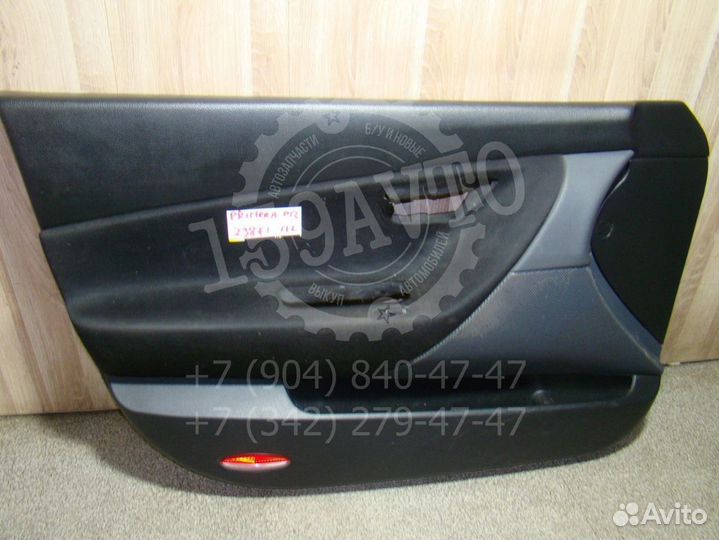 Обшивка двери передней левой Nissan Primera (P12)