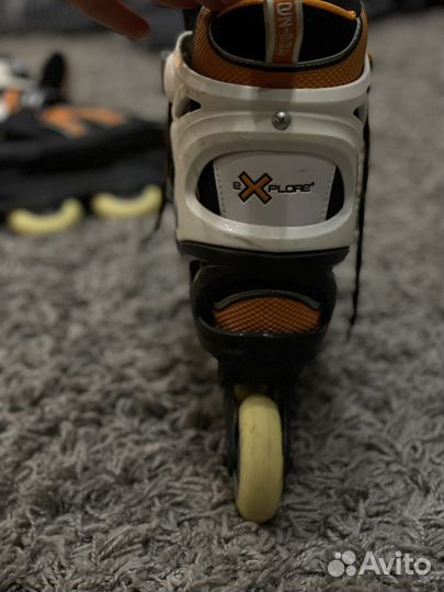 Роликовые коньки