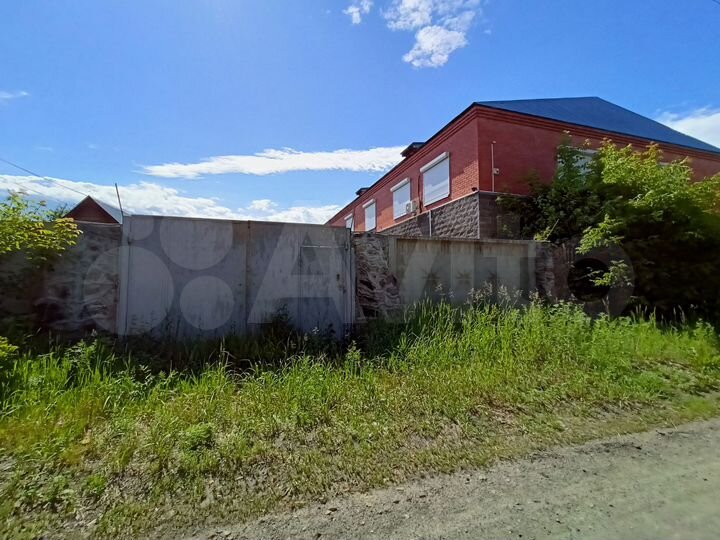 Коттедж 615 м² на участке 12 сот.