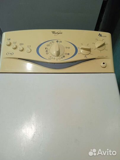 Стиральная машина с вертикальной загрузкой