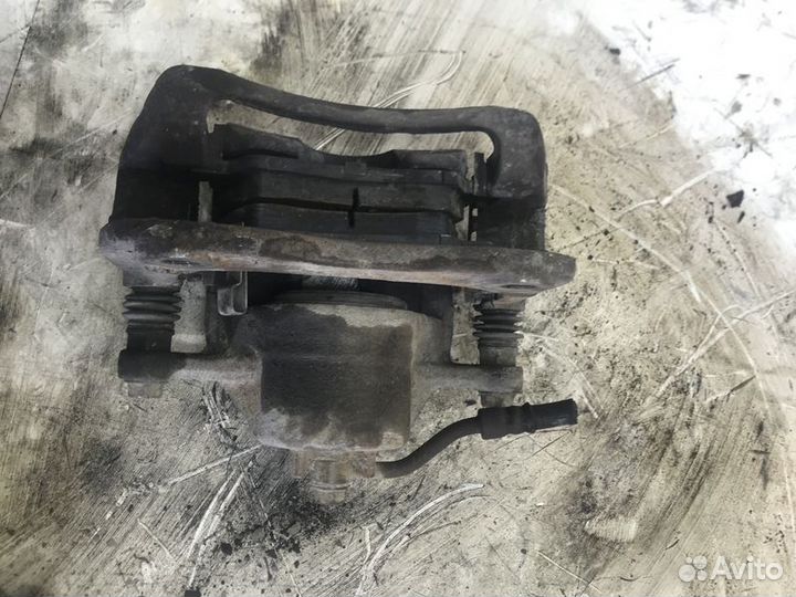 Суппорт тормозной передний левый Hyundai Solaris