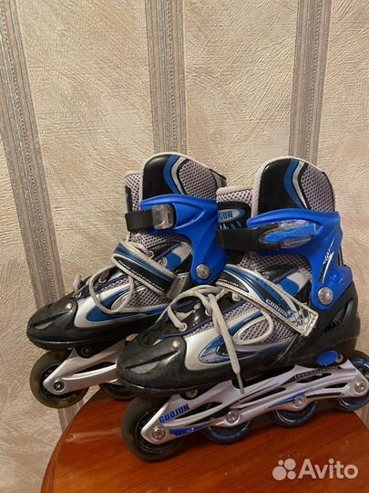 Роликовые коньки