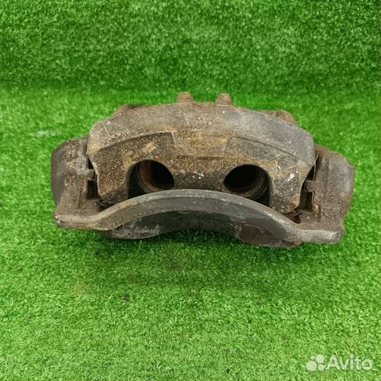 Суппорт тормозной передний левый SsangYong Actyon