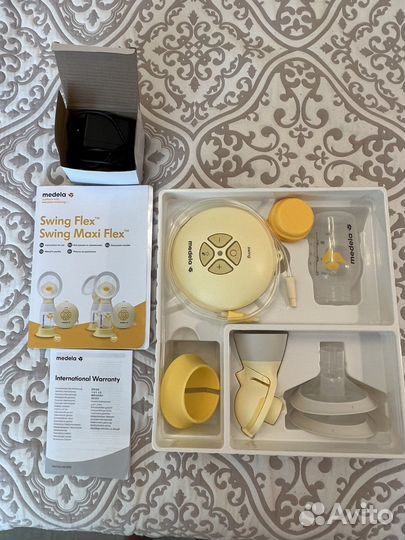 Молокоотсос medela swing flex электрический