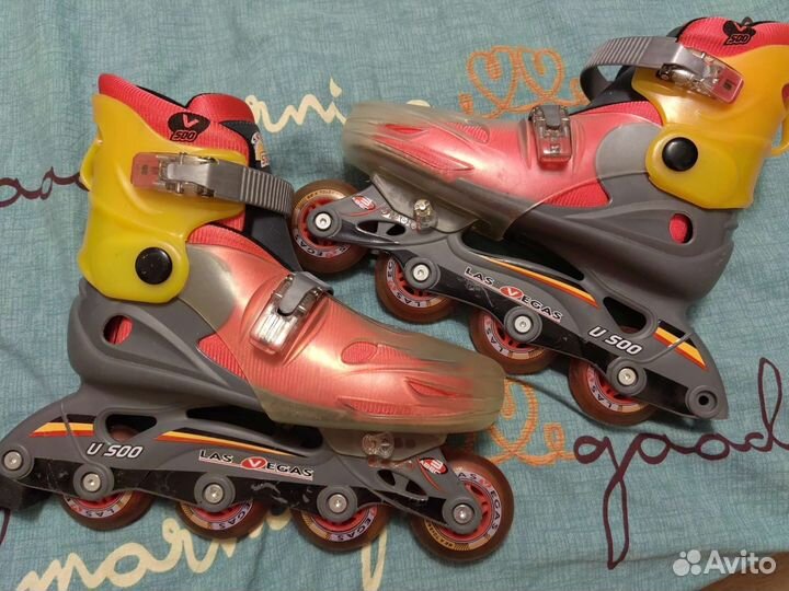 Роликовые коньки