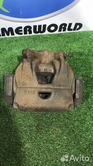 Суппорт тормозной передний правый Jaguar XF