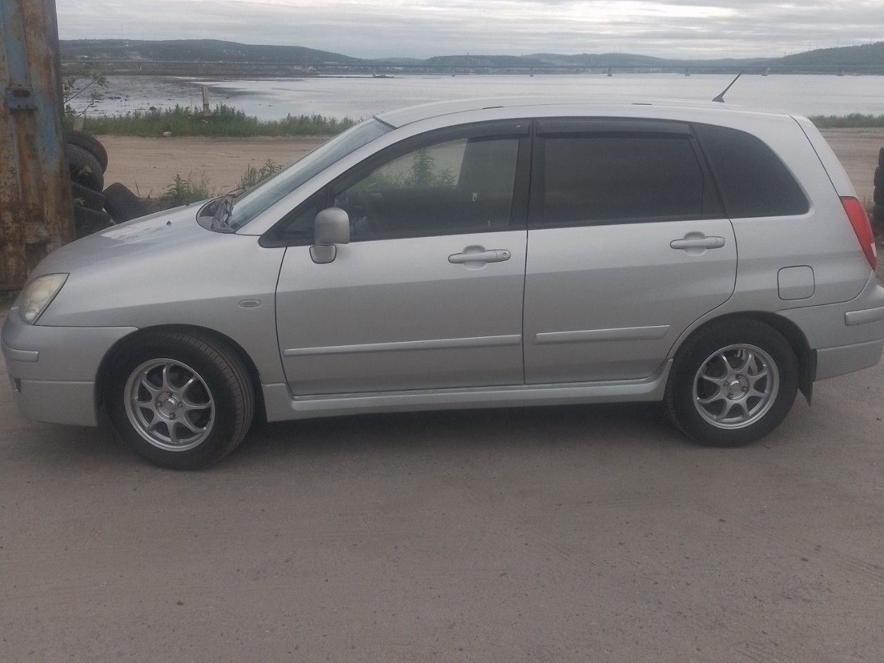 Suzuki Liana: фото владельца