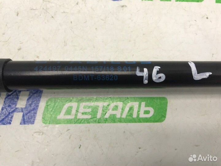 Амортизатор крышки багажника задний левый Mazda