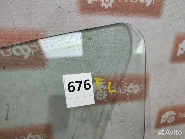 Стекло двери переднее левое Renault Logan LS0G K7J