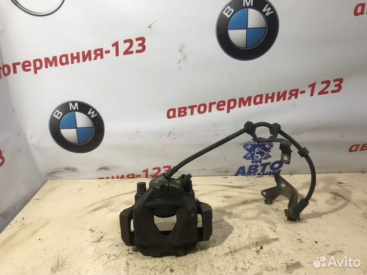 Суппорт тормозной передний левый Bmw X1 E84