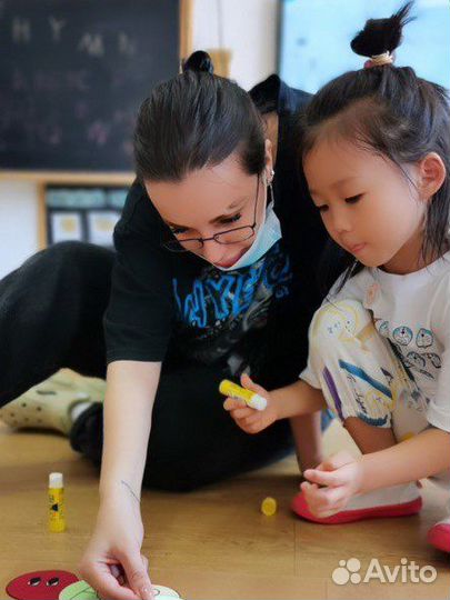 Преподаватель английского языка