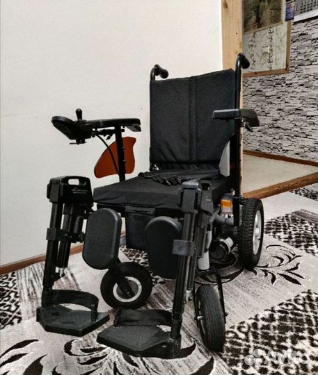 Инвалидная коляска с электроприводом