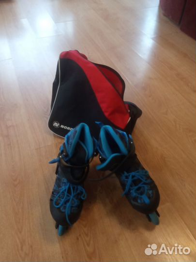 Роликовые коньки