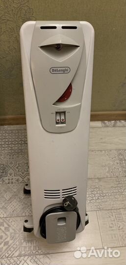 Масляный обогреватель delonghi