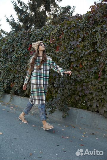 Теплая шапка из шерсти в бежевом цвете