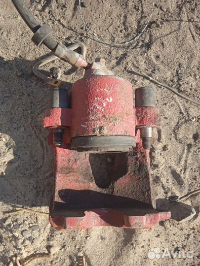 Суппорт тормозной передний левый Seat Leon