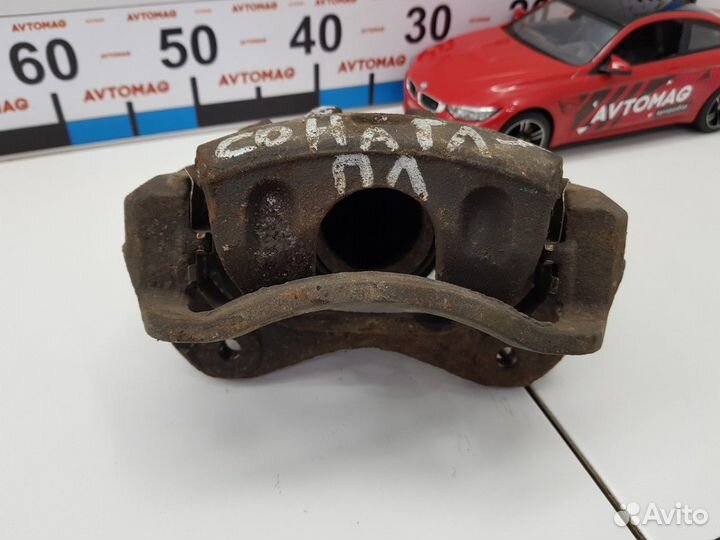 Суппорт передний левый (Hyundai Sonata)