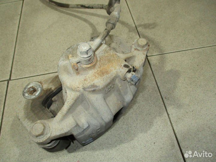 Суппорт передний левый Kia Sportage 3 (SL)