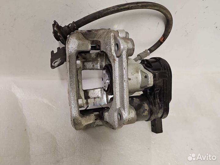 Суппорт тормозной задний левый Hyundai Sonata DN8