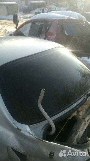 Стекло заднее Kia Spectra