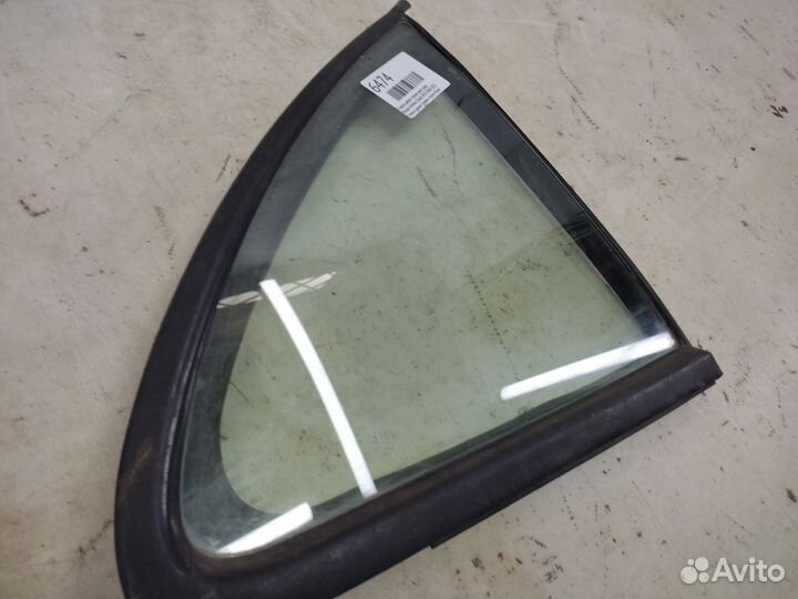 Стекло двери глухое заднее правое Nissan Almera