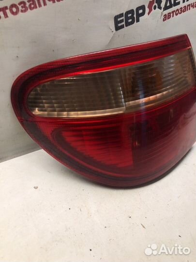 Фонарь левый Nissan Almera N16 седан 1.8 QG18 2001
