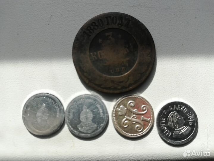 Монеты и жетоны